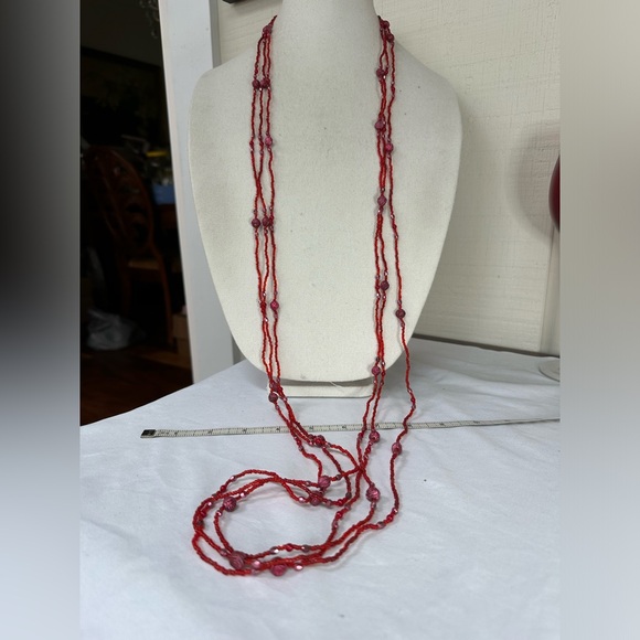 Four pink and fuchsia colored necklaces - Picture 5 of 6